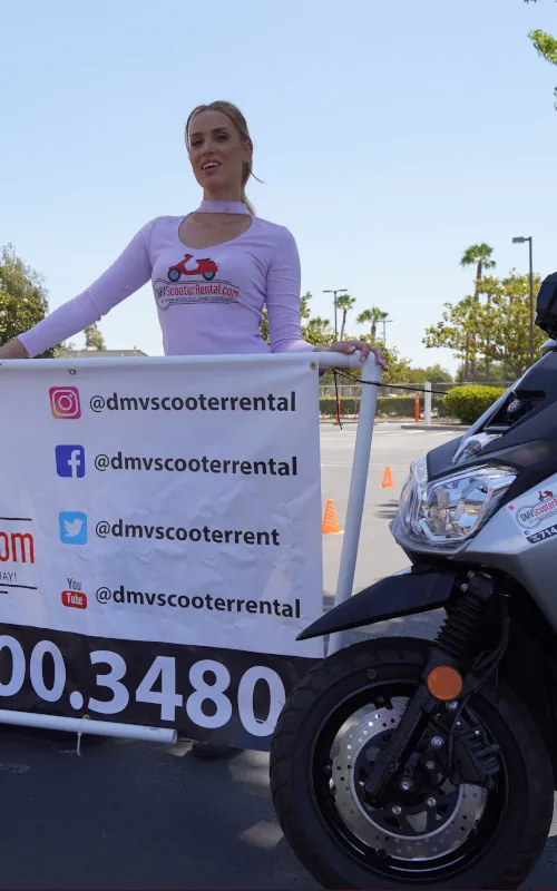 Woman on scooter for DMV M1 test rental